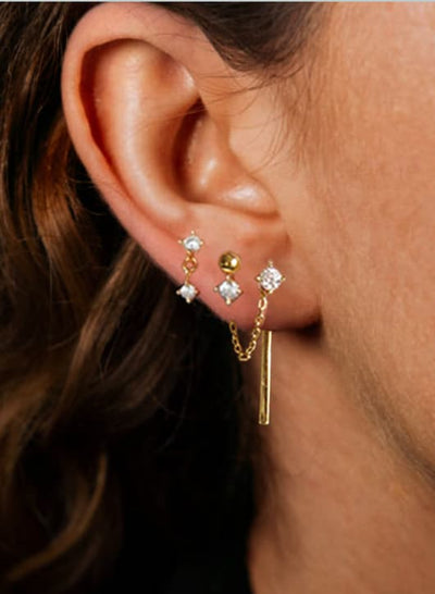 bar earring set on model