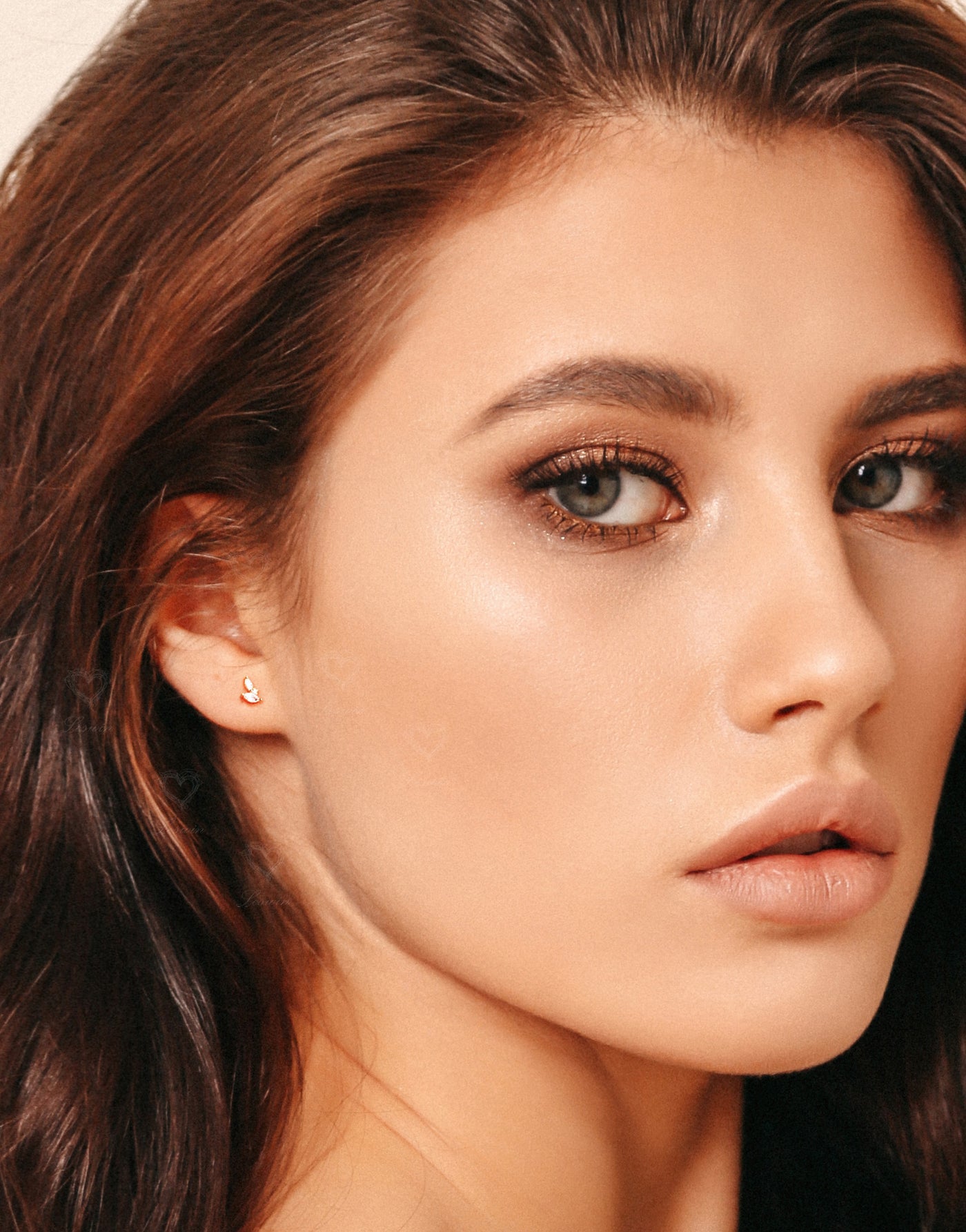 floral earrings on model closeup